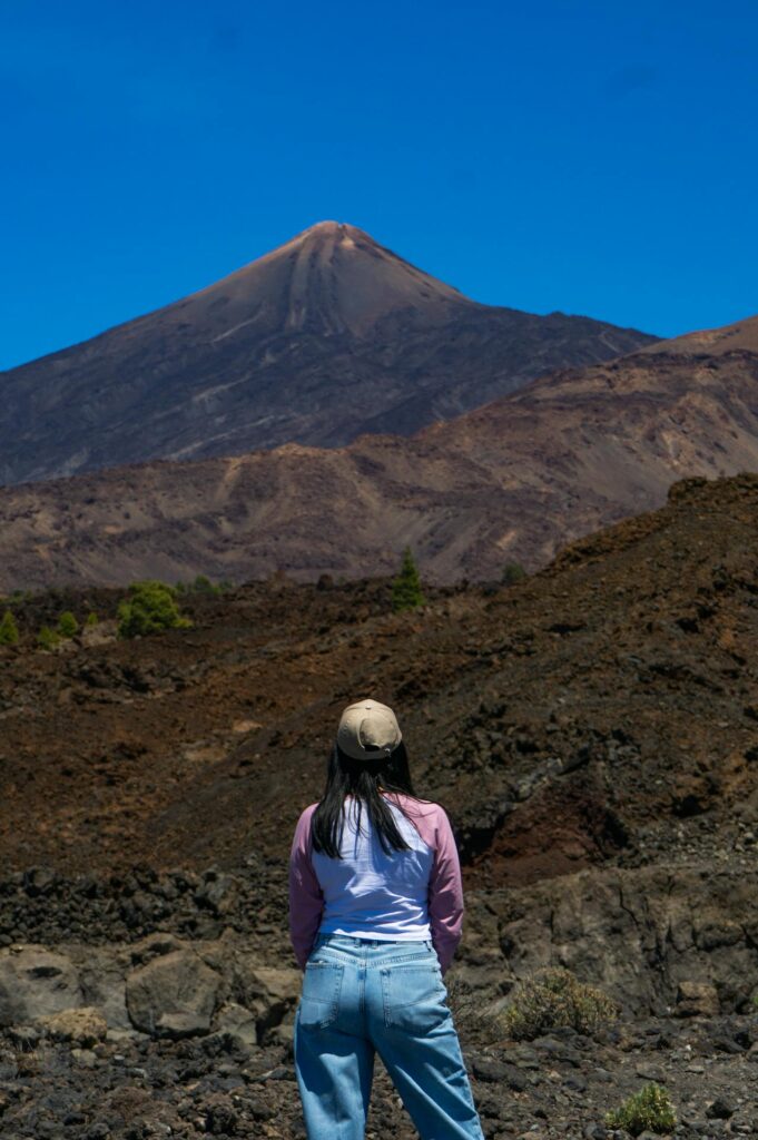 Woman gazing at volcano